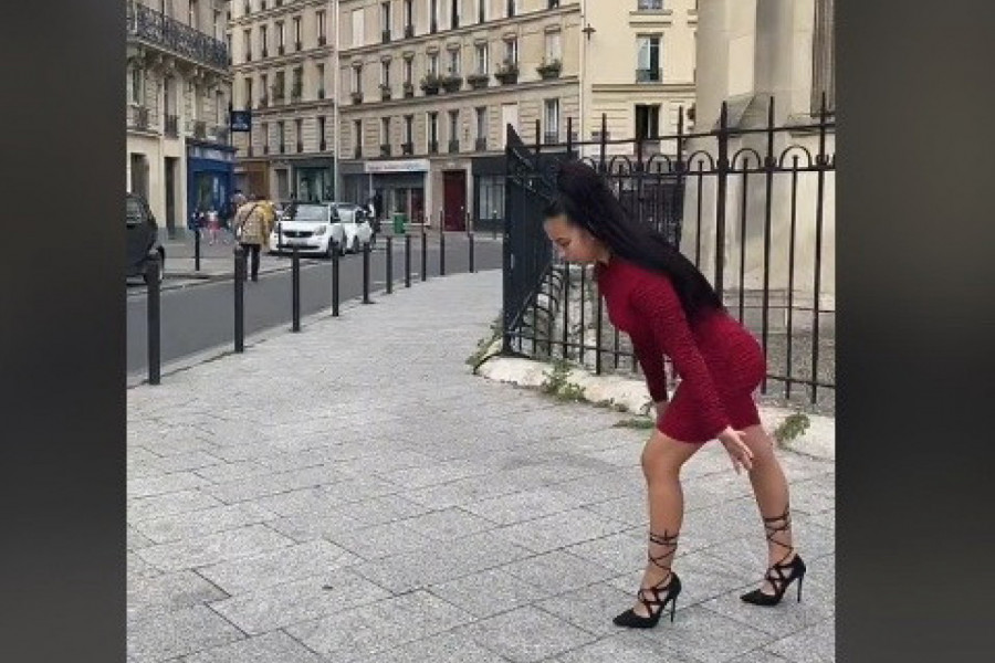 ONO ŠTO ONA ZNA, RETKO KO UME: Atraktivnu crnka na visokim štiklama šetala ulicom i savila se, usledila je šok akrobacija!