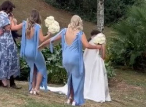 POKUŠALA JE DA HODA NIZBRDO U VISOKIM POTPETICAMA: Evo kako se "provela" jedna deveruša na venčanju svoje prijateljice! (VIDEO)
